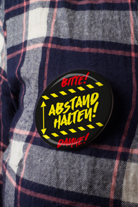 Bitte halte Abstand Button